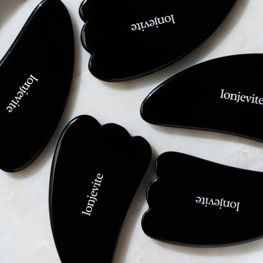 WING - SHAPE BLACK OBSIDIAN GUA SHA